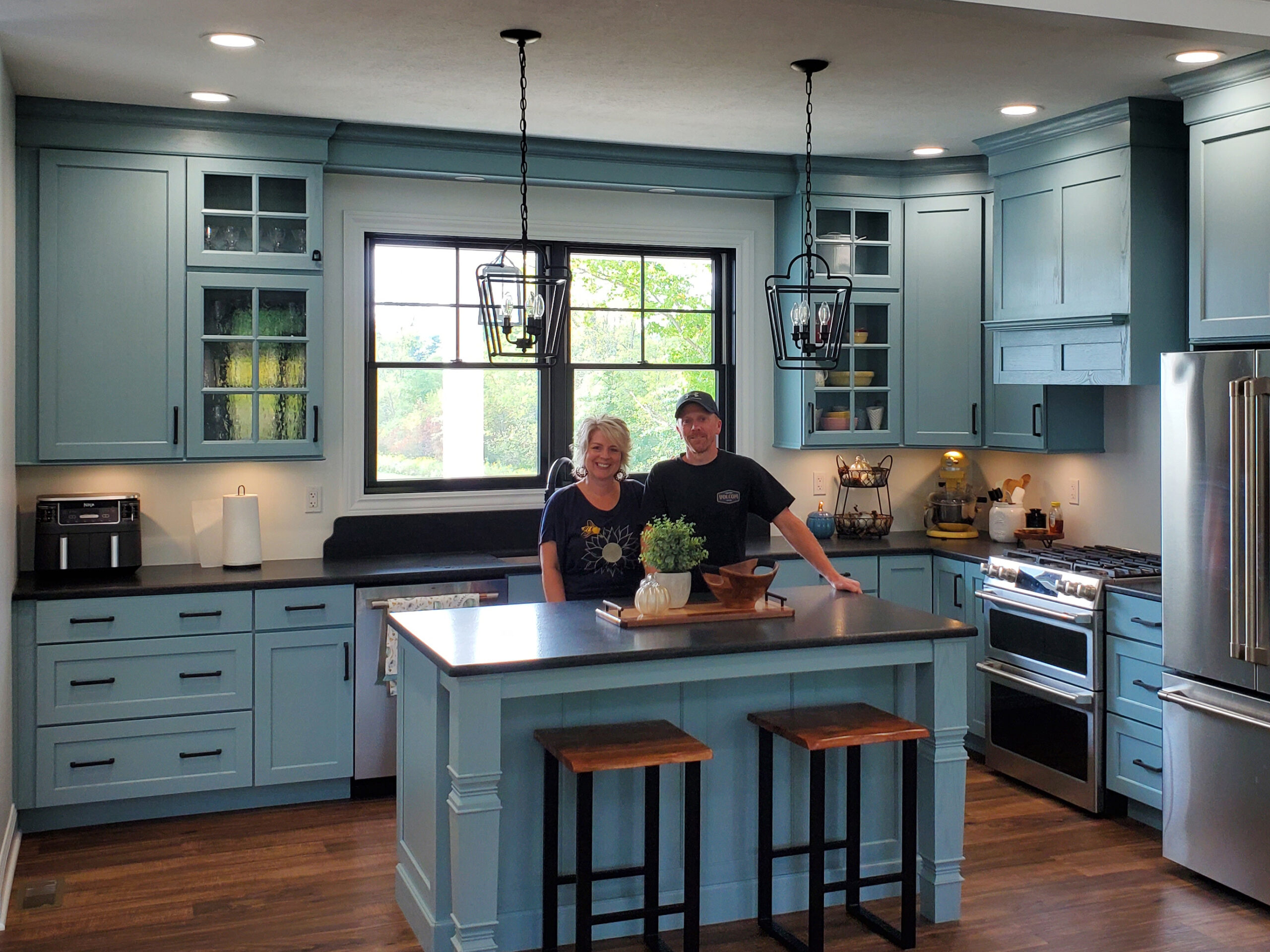 Couple standing in new kitchen